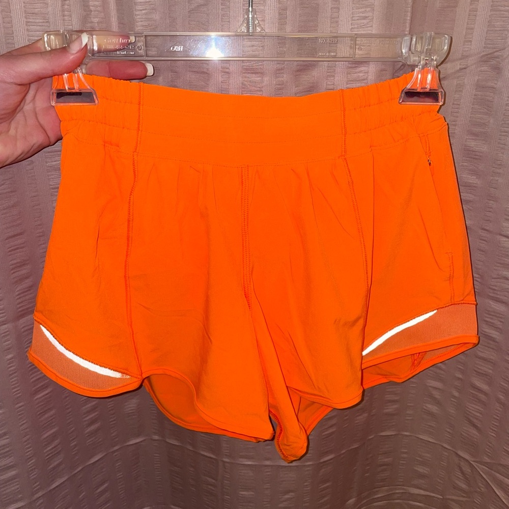 high light orange lululemon shorts